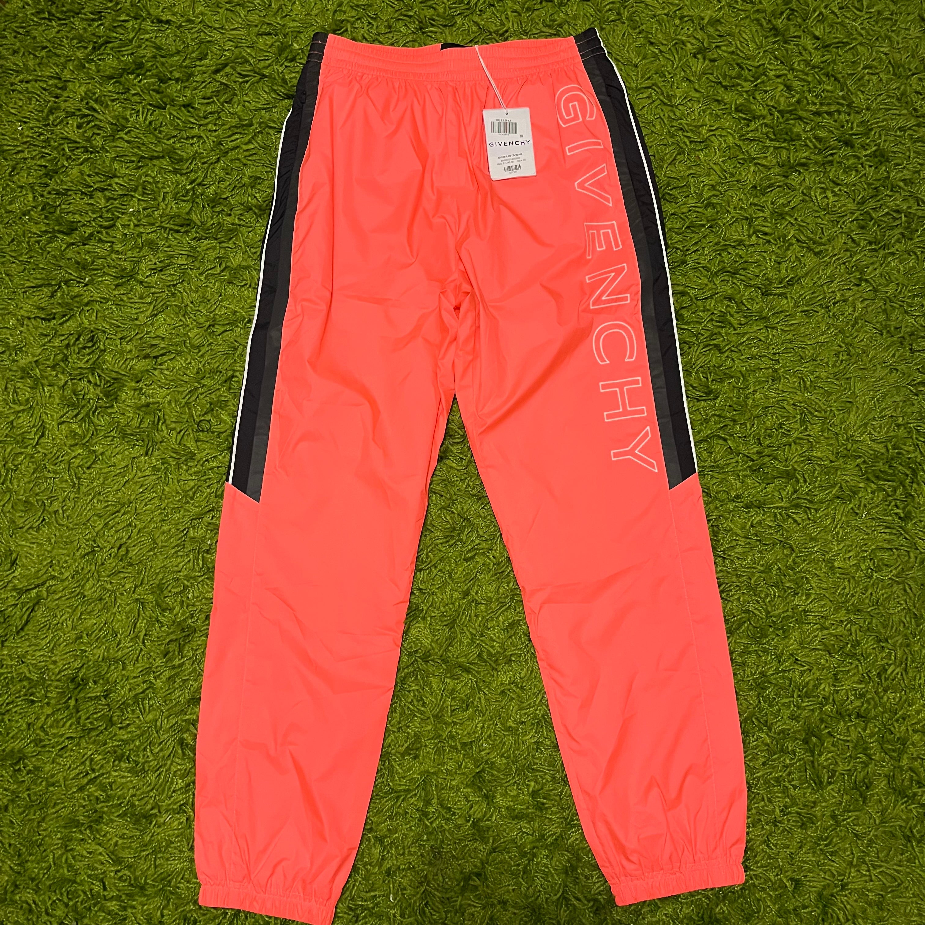 Givenchy neon pink polyester track pants